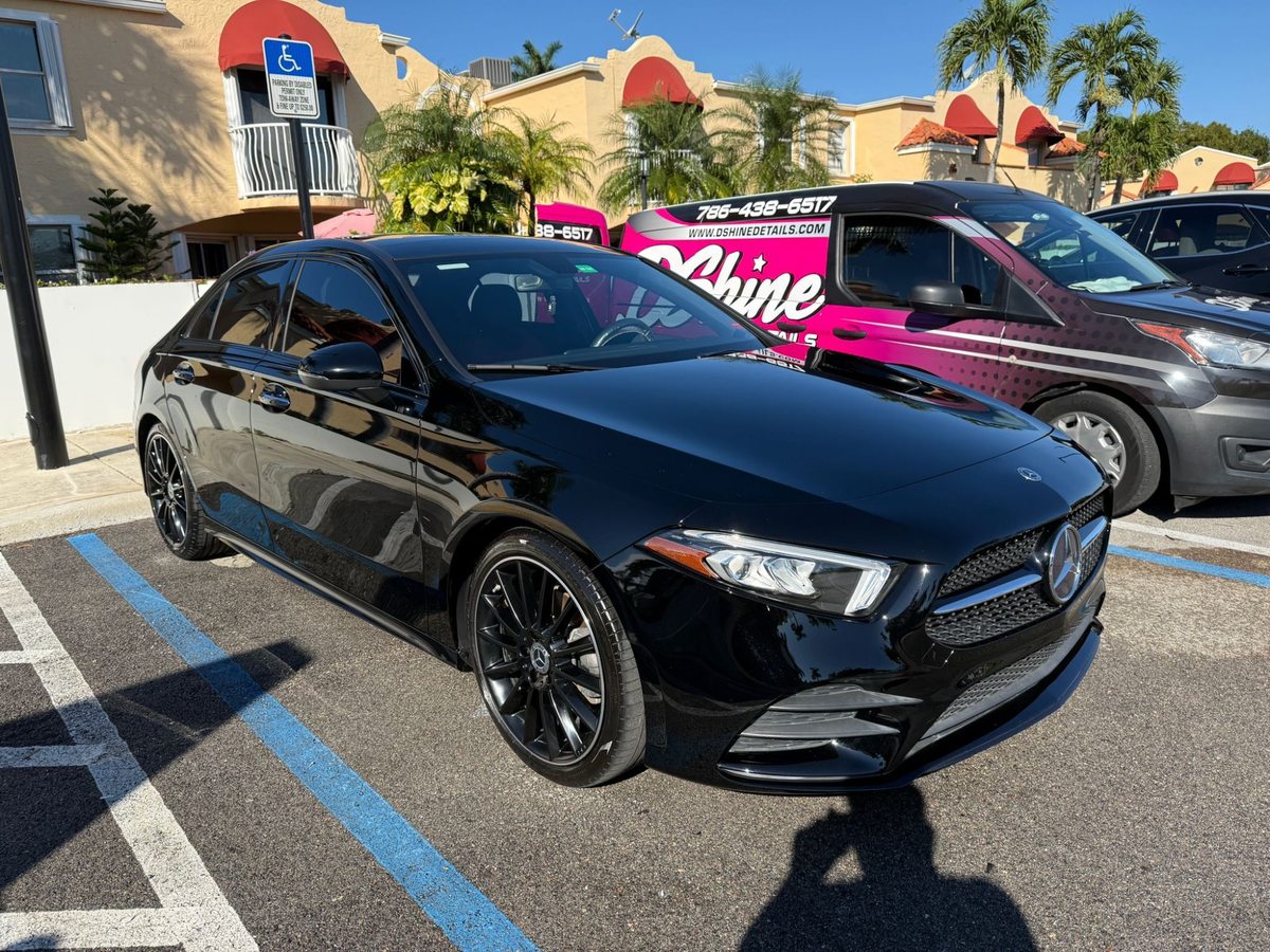 Mirror-finish on luxury vehicle after paint correction and ceramic coating by DShine Details Miami