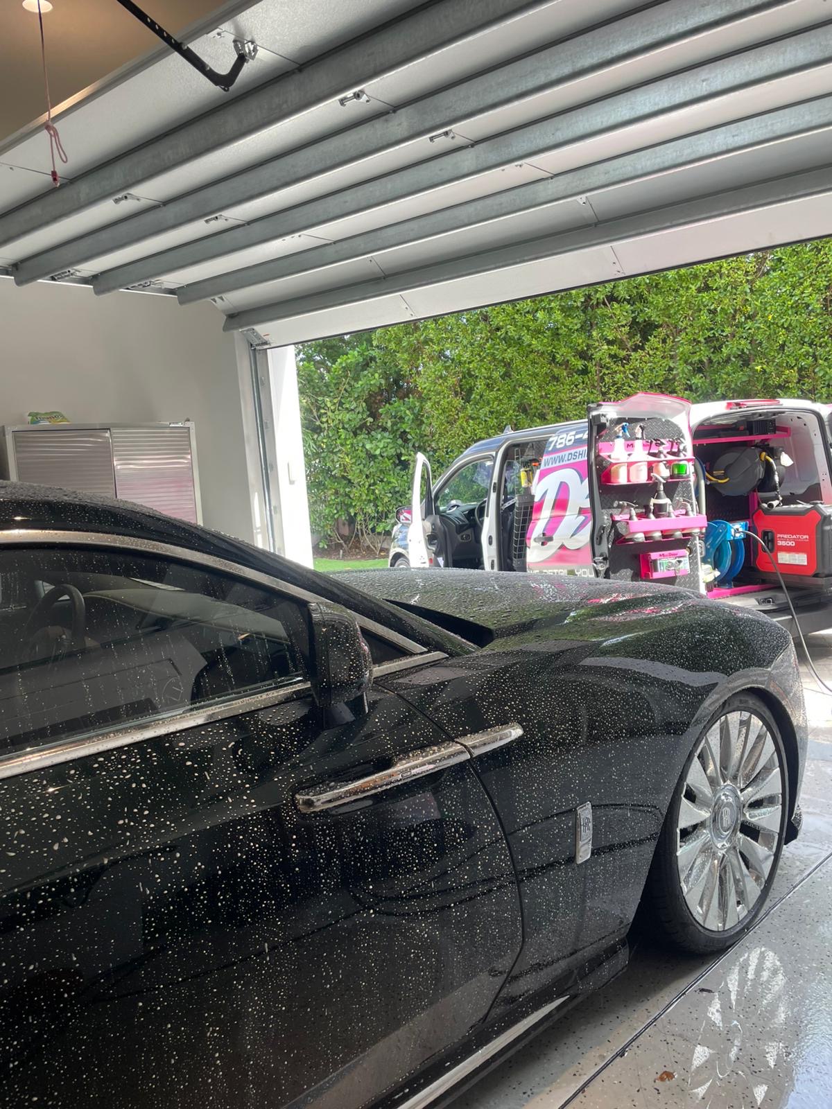 Black Rolls-Royce Ghost in a Miami Beach private garage with DShine Details